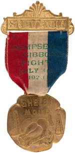 1923 "SOUVENIR" RIBBON BADGE W/BRASS FOB FOR "DEMPSEY/GIBBONS/FIGHT/JULY 4/1923".