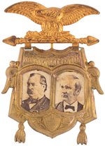 CLEVELAND & HENDRICKS 1888 ORNATE BRASS SHELL JUGATE BADGE.