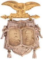 HARRISON & REID 1892 ORNATE BRASS SHELL JUGATE BADGE.