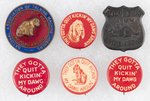 CHAMP CLARK ENAMEL PLUS FIVE "QUIT KICKING MY DAWG AROUND" SLOGAN BADGES.