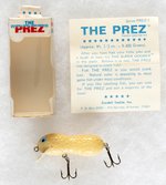 JIMMY CARTER "THE PRES" PEANUT SHAPED FISHING LURE WITH CARTER STYLE TEETH IN ORIGINAL BOX W/INSERT PAPER.