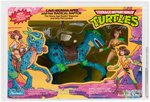 TEENAGE MUTANT NINJA TURTLES CAVE-TURTLE 2-PACK CAVE-WOMAN APRIL W/RADICAL RAPTOR AFA 75 EX+/NM.