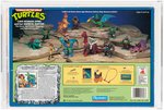 TEENAGE MUTANT NINJA TURTLES CAVE-TURTLE 2-PACK CAVE-WOMAN APRIL W/RADICAL RAPTOR AFA 75 EX+/NM.