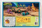 TEENAGE MUTANT NINJA TURTLES CAVE-TURTLE 2-PACK DON W/TRIPPY TYRANNOSAURUS AFA 70 EX+.