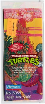 TEENAGE MUTANT NINJA TURTLES CAVE-TURTLE 2-PACK BEBOP W/BODACIOUS BRONTOSAURUS AFA 75 EX+/NM.