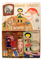 "ANNIE OAKLEY SEWING SET" AND STORYBOOK DOLL.