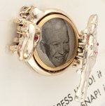 "WIN WITH IKE/PICTURE LOCKET" ORIGINAL CARD HOLDING METAL ELEPHANT W/COVER REVEALING IKE PHOTO.