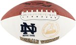 NOTRE DAME HEISMAN TROPHY WINNERS MULTI-SIGNED FOOTBALL & FIGHTING IRISH FOOTBALL ENCYCLOPEDIA.