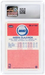 1986-87 FLEER #82 AKEEM OLAJUWON (HOF) ROOKIE CARD CSG 9 MINT.