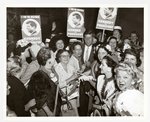 JOHN KENNEDY AT CENTER OF FEMALE SUPPORTERS WITH BUTTONS AND POSTERS 1960 PRESS PHOTO.