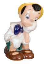 PINOCCHIO FIGURINE BY BRAYTON LAGUNA.