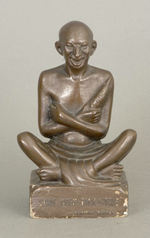 HAKE COLLECTION "MAHATMA GHANDI SMILE MUCH - TALK LITTLE" FIGURAL CIRCA LATE 1930s.