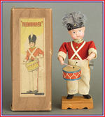 "THE DRUMMER" LARGE BOXED CELLULOID WIND-UP.