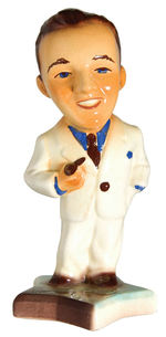 "BING CROSBY" CERAMIC FIGURINE.