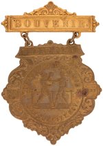 1897 "GREAT FIGHT CORBETT/FITZSIMMIONS/CARSON CITY" BRASS BADGE WITH SCENE OF THEM IN BOXING RING.