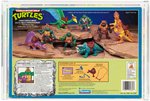 TEENAGE MUTANT NINJA TURTLES (1994) CAVE-TURTLE MIKE & SILLY STEGOSAURUS 2-PACK AFA 75 EX+/NM.