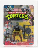 TEENAGE MUTANT NINJA TURTLES (1988) - ROCKSTEADY SERIES 1/10 BACK AFA 75+ EX+/NM.