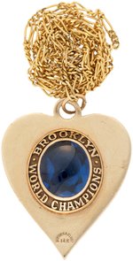 1955 BROOKLYN DODGERS "WORLD CHAMPIONS" IMPRESSIVE AND HIGH QUALITY PRESENTATION PENDANT.