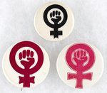 TRIO OF DIFFERENT COLORED WOMEN'S LIBERATION SYMBOL BUTTONS.