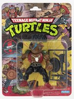 TEENAGE MUTANT NINJA TURTLES (1988) - BEBOP SERIES 1/10 BACK CARDED ACTION FIGURE.