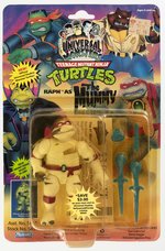 UNIVERSAL STUDIOS MONSTERS TEENAGE MUTANT NINJA TURTLES (1993) - RAPH AS THE MUMMY CARDED ACTION FIGURE.