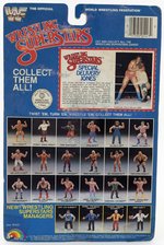 WWF LJN WRESTLING SUPERSTARS SERIES 3 SPECIAL DELIVERY JONES (RED SHIRT VARIETY) CARDED ACTION FIGURE.