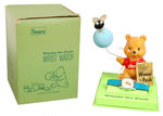 "WINNIE THE POOH" BOXED WATCH WITH FIGURINE.