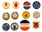 BETWEEN THE WARS COLLECTION OF 12 MILITARY-THEME CELLULOID BUTTONS.