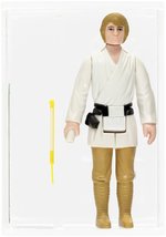 STAR WARS (1977) - LOOSE ACTION FIGURE LUKE SKYWALKER AFA 85 NM+ (BROWN HAIR/DARK PANTS).