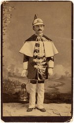 OVERSIZED CABINET CARD OF ALBANY, NEW YORK TORCHLIGHT PARADE MARCHER WEARING 1888 RIBBON.