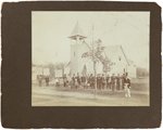 TAFT OVERSIZED IMAGE OF PARADE SCENE INCLUDING FLAGS, SIGNS, HATS & MORE.