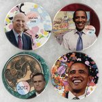 OBAMA, McCAIN & ROMNEY QUARTET OF 2008 & 2012 CAMPAIGN BUTTONS W/ART BY DAVID RUSSELL.