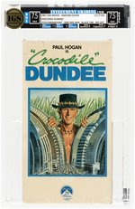 CROCODILE DUNDEE VHS (1987) IGS BOX 7.5 NM SEAL 7.5 NM (ENGLISH COVER/75th PARAMOUNT/SIDE PHV WM/BLACK TAB/NO UPC).