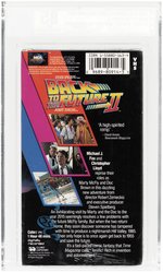 BACK TO THE FUTURE: PART II VHS (1990) VGA 85 NM+ (VERTICAL OVERLAP/BLUE FILM REEL WATERMARK).
