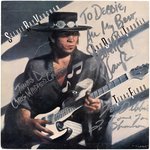 STEVIE RAY VAUGHAN AND DOUBLE TROUBLE BAND-SIGNED "TEXAS FLOOD" LP FLAT.