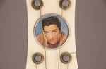 ELVIS PRESLEY ENGLISH FOUR-STRING GUITAR W/BOX.