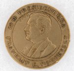 ROOSEVELT BRASS TOKEN "WORTH $2.50 ON ANY PURCHASE OF $25 OR OVER / UNION MAY-STERN MAIN STORE 1120-1130 OLIVE ST. SAINT LOUIS".