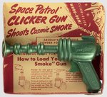 SPACE PATROL CLICKER (SMOKE) GUN ON CARD.