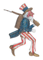 EXCEPTIONAL LARGE EMBOSSED BRASS SHELL PIN UNCLE SAM HEADED TO CUBA 1898.