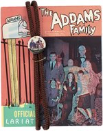 THE ADDAMS FAMILY OFFICIAL LARIAT ON CARD.