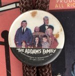 THE ADDAMS FAMILY OFFICIAL LARIAT ON CARD.