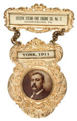 LARGE 1911 FIRE DEPARTMENT VISITATION BADGE.