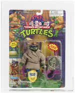 TEENAGE MUTANT NINJA TURTLES (1994) - UNDERCOVER LEONARDO SERIES 7/97 BACK AFA 80 Y-NM (PURPLE ACCESSORIES W/CARD & COIN).