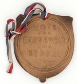 ROOSEVELT AND COMSTOCK MICHIGAN COATTAIL BADGE.