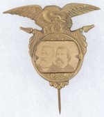 BLAINE & LOGAN 1884 JUGATE ON ORNATE BRASS SHELL EAGLE STICKPIN BADGE HAKE #3089.