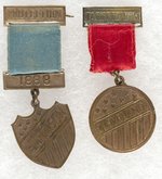 HARRISON & CLEVELAND PAIR OF 1888 RIBBON BADGES.