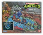 TEENAGE MUTANT NINJA TURTLES/TEENAGE MUTANT HERO TURTLES (1989) - FOOTSKI CAS 80+ (EUROPEAN RELEASE).