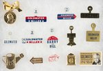 ASSORTED GROUPING OF GOLDWATER TABS, PINS, AND STAMPS.