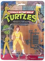TEENAGE MUTANT NINJA TURTLES (1988) - APRIL O'NEIL (NO STRIPE VARIETY) SERIES 1/10 BACK ACTION FIGURE ON CARD.