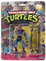 TEENAGE MUTANT NINJA TURTLES (1988) - FOOT SOLDIER SERIES 1/10 BACK ACTION FIGURE ON CARD.